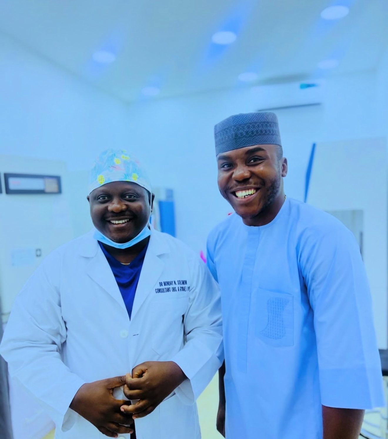 Stakeholders in a laboratory environment at Cardinal Care Hospital and Maternity.