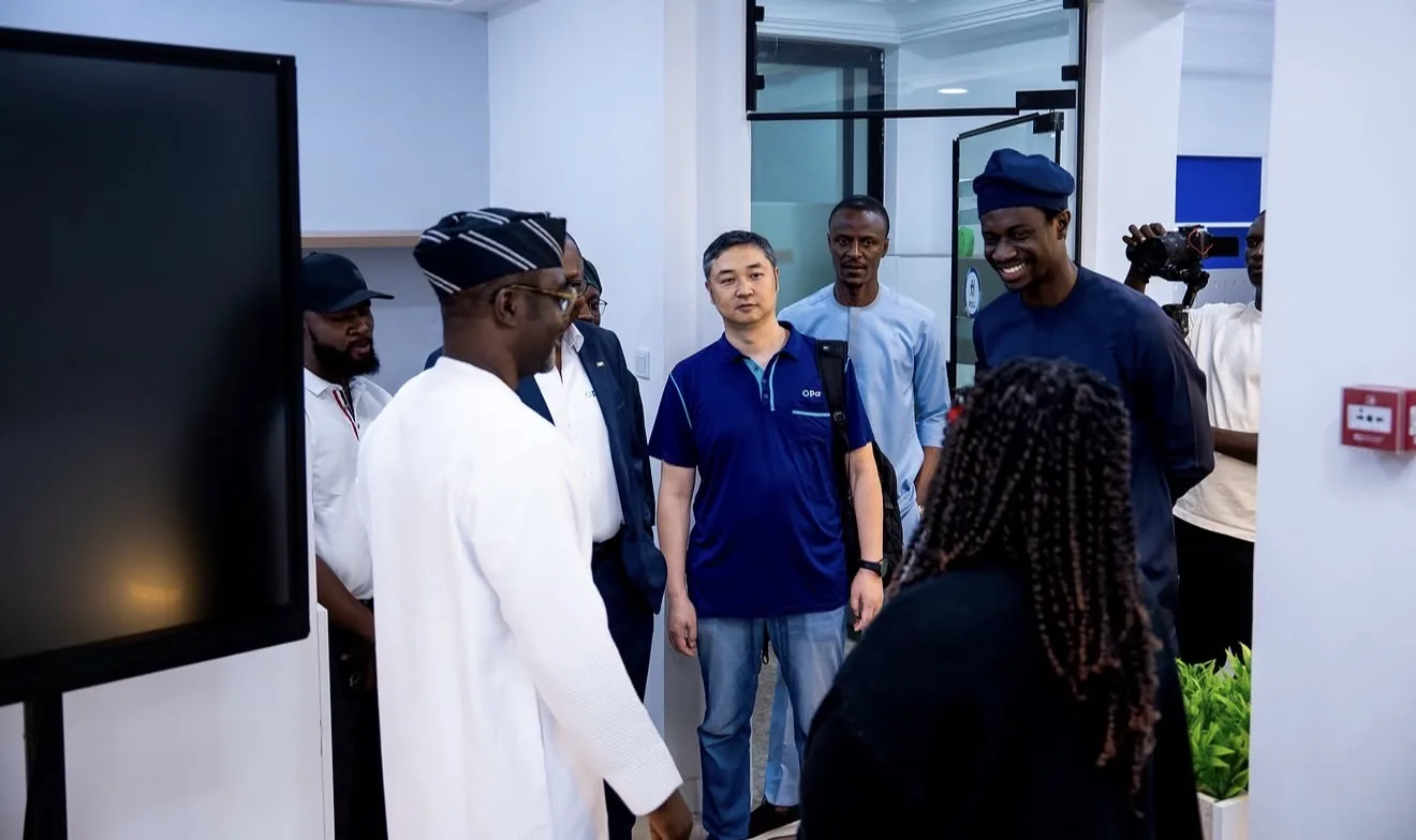Visitors during a tour of the Miva robotics and innovation lab.